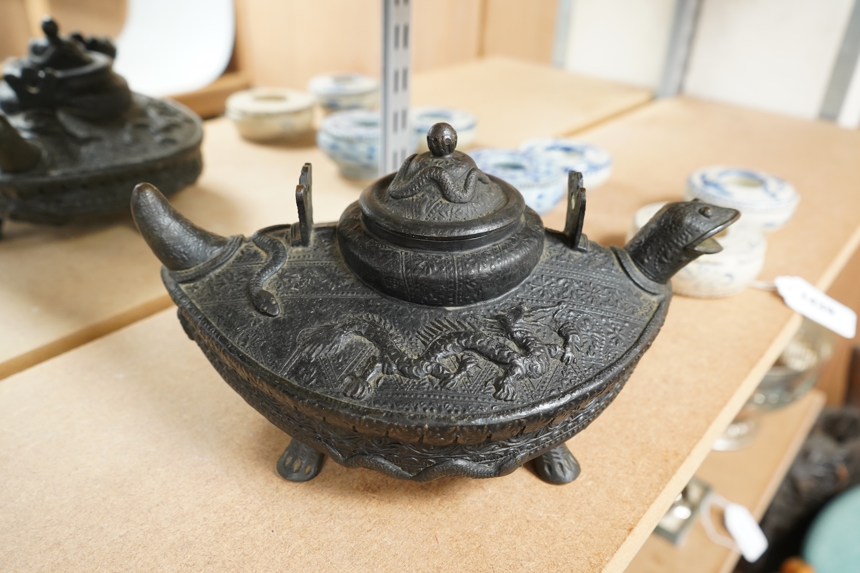 A Chinese cast bronze 'tortoise’ ritual tea kettle, 30cm long